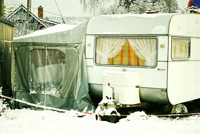 camper parked in the snow