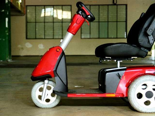 side view of a motorized scooter