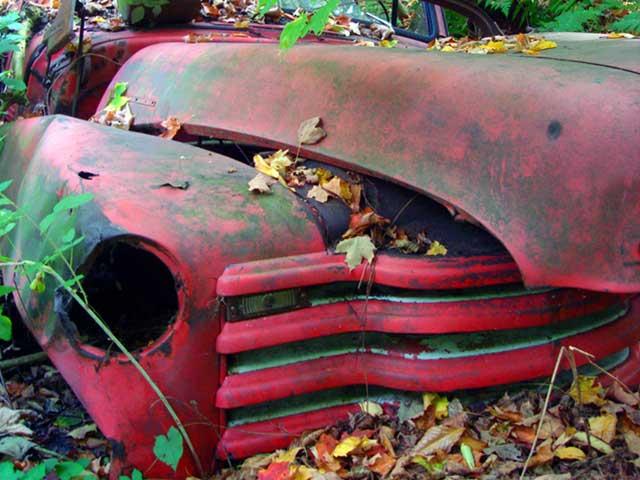 junk red classic vehicle