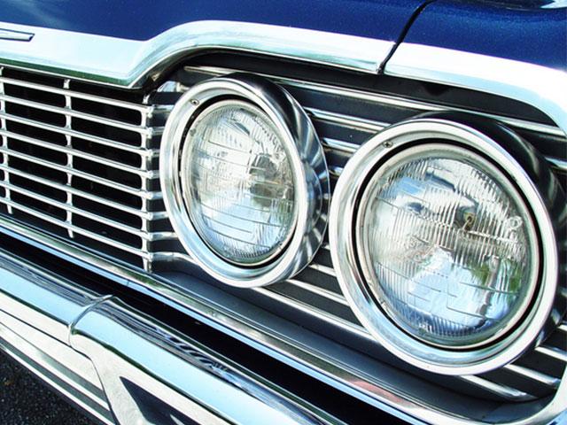headlights and grill on front of classic car