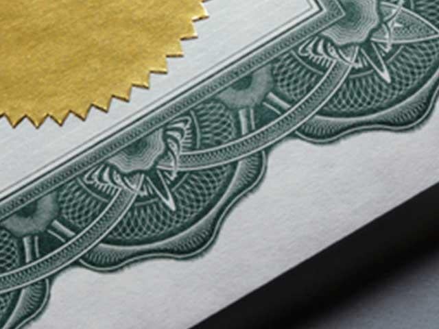 corner of certificate with small part of gold seal showing